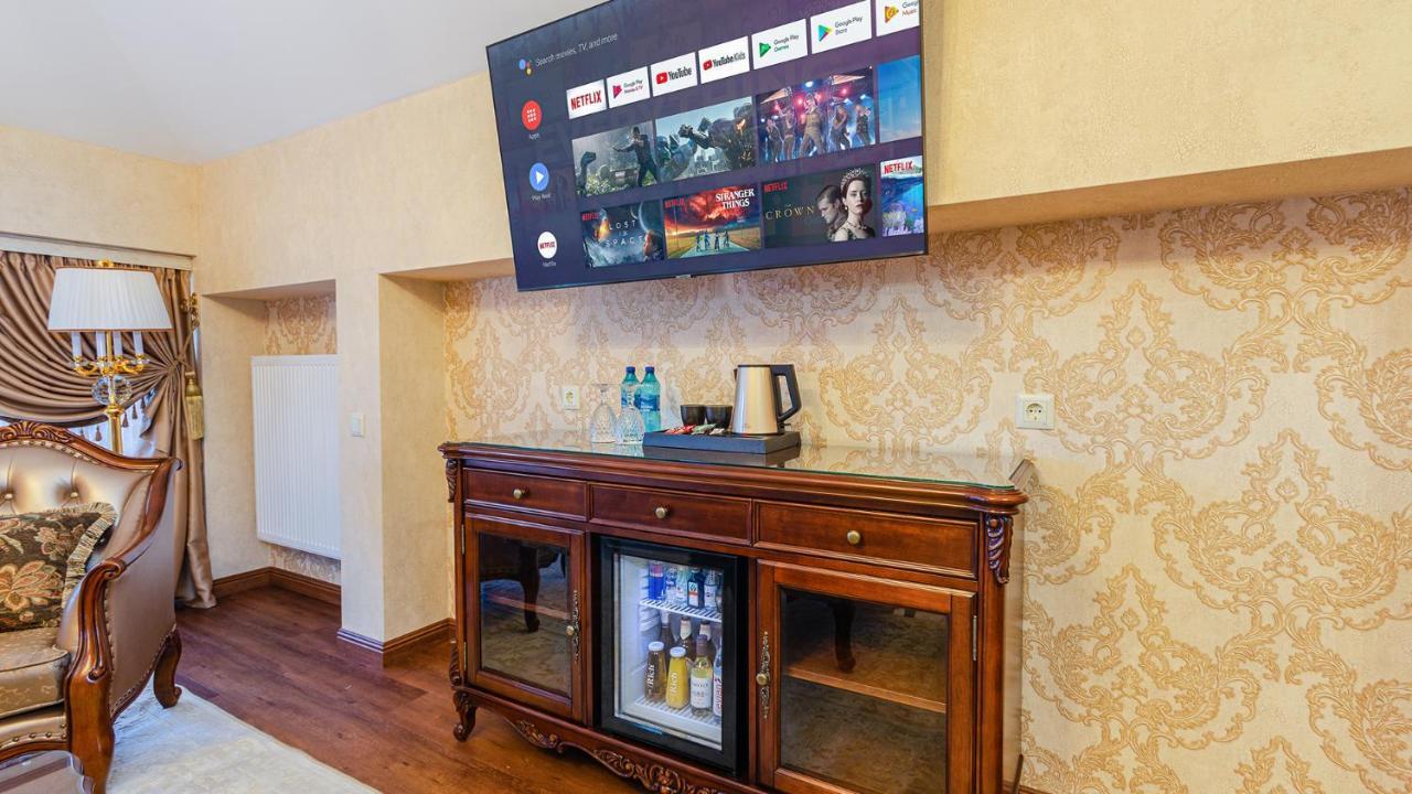 Gregory Boutique Hotel Chisinau Exterior photo A television mounted on a wall